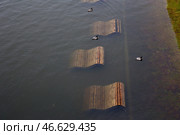 Подтопленная набережная реки. Стоковое фото, фотограф Андрей Самсонов / ТАСС / Фотобанк Лори