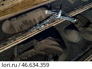 Стакер-реклаймер с ковшовым колесом на складе хранения угля. Стоковое фото, фотограф Юрий Смитюк / ТАСС / Фотобанк Лори