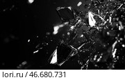 Shattered glass exploding in sharp fragments on dark background. Стоковое AI-изображение, AI-художник Михаил Коханчиков / Фотобанк Лори