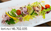 Salad with boiled squid, lime and smoked paprika. Стоковое фото, фотограф Яков Филимонов / Фотобанк Лори