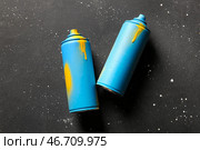 Аэрозольные баллончики на черном фоне. Стоковое фото, фотограф Pixel_shot / Фотобанк Лори