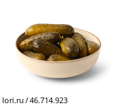 Миска с вкусными квашенными огурцами на белом фоне. Стоковое фото, фотограф Pixel_shot / Фотобанк Лори
