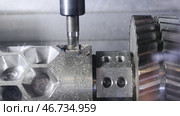 Close-up of the metal workpiece processing on the latest machine. Стоковое фото, фотограф David Kashakhi / Фотобанк Лори