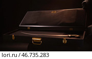 Hands in leather gloves open beautiful case with the antique exhibit, steel sabre inside. Стоковое фото, фотограф David Kashakhi / Фотобанк Лори