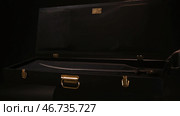 Hands in leather gloves open beautiful case with the antique exhibit, steel sabre inside. Стоковое фото, фотограф David Kashakhi / Фотобанк Лори