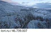 Snowy expanses in the mountainous area near the city. Стоковое фото, фотограф David Kashakhi / Фотобанк Лори