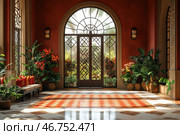 A luxurious room in an oriental or Mediterranean style. The central element is a large arched door with an exquisite metal grille, through which a green garden with palm trees and flowering plants can be seen. Warm shades prevail in the interior: terracotta walls, a patterned carpet, rich greenery in ceramic pots and wooden furniture. Stylish lamps are located on the side walls, creating a cozy atmosphere. The overall style of the space is reminiscent of Moroccan or Andalusian design, where elegance is combined with natural harmony. Стоковое AI-изображение, AI-художник Анна Кривицкая / Фотобанк Лори