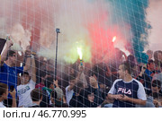 Russia, Samara. 30. 08. 2015. active young football fans at the stadium. Text in Russian: Samara Krylya Sovetov. Редакционное фото, фотограф Акиньшин Владимир / Фотобанк Лори