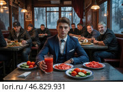Молодой человек в костюме наслаждается вегетарианским обедом среди пьяниц в пивном баре. Стоковое AI-изображение, AI-художник Сергей Никифоров-Гордеев / Фотобанк Лори