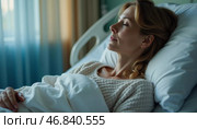 In a serene hospital room, a sick woman rests peacefully in her bed, eyes closed and expression calm. Wrapped in soft blankets, she embodies the strength to endure and heal. Стоковое AI-изображение, AI-художник Юлия Петровская / Фотобанк Лори