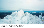 Great panorama view of the snowy massive mountain with mountain cliff. Стоковое фото, фотограф David Kashakhi / Фотобанк Лори