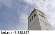 White Church steeple on background of blue sky. Стоковое фото, фотограф David Kashakhi / Фотобанк Лори