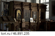 View inside of a church with the iconostasis showing religious biblical stories, concept of faith. Стоковое фото, фотограф David Kashakhi / Фотобанк Лори