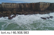 Atlantic coast with rock cliffs and waves. Стоковое видео, видеограф Михаил Коханчиков / Фотобанк Лори