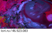 Liquid paint patterns with bubbles are blurred and new unique pattern is created. Стоковое фото, фотограф David Kashakhi / Фотобанк Лори