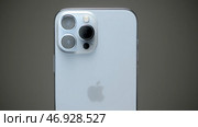 Stylish exterior design of new iPhone with metal case and three cameras (2021 год). Редакционное фото, фотограф David Kashakhi / Фотобанк Лори