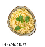 Чаша с вкусным кус-кусом и шпинатом на белом фоне. Стоковое фото, фотограф Pixel_shot / Фотобанк Лори