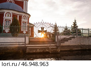 The Golden Ring of Russia, the city of Pereslavl-Zalessky. The Church of the Forty Sevastian Martyrs is reflected at sunset in Pleshcheyev Lake. Стоковое фото, фотограф Photojuli / Фотобанк Лори