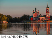 The Golden Ring of Russia, the city of Pereslavl-Zalessky. The Church of the Forty Martyrs of Sebaste at a beautiful pink sunset on the side of Lake Pleshcheyev. Стоковое фото, фотограф Photojuli / Фотобанк Лори