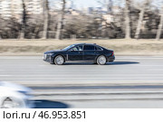 Hongqi H5 rushing on the city road. Black chinese sedan car moving on the street. Редакционное фото, фотограф Константин Григорьев / Фотобанк Лори