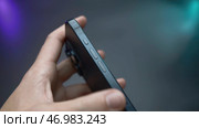 UK, London - September 15, 2023: Close-up of new 15 iPhone pro. Редакционное фото, фотограф David Kashakhi / Фотобанк Лори