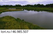 Beautiful landscape with swampy terrain in cloudy weather. Стоковое фото, фотограф David Kashakhi / Фотобанк Лори