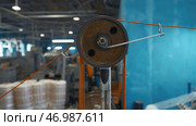 System with coils of tensioning wires on industrial machine. Стоковое фото, фотограф David Kashakhi / Фотобанк Лори