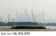 View from the embankment on the city sky scrapers in fog. Стоковое фото, фотограф David Kashakhi / Фотобанк Лори