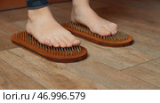 Practice of standing on nails, concept of feelings breakthrough. Стоковое фото, фотограф David Kashakhi / Фотобанк Лори