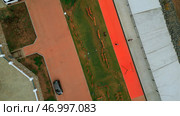 Aerial drone view of city river embankment. Стоковое фото, фотограф David Kashakhi / Фотобанк Лори