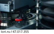 Close up of metal tubes of biochemical analyzer. Стоковое фото, фотограф David Kashakhi / Фотобанк Лори