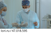 Close up of surgery performed by professional specialists. Стоковое фото, фотограф David Kashakhi / Фотобанк Лори