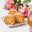 Festive sweet treat rich in vitamins and fiber, carrot and pumpkin roll on a white background with a copy space. Стоковое фото, фотограф Неведицына Елена / Фотобанк Лори