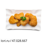 Вкусные самородки на белом фоне. Стоковое фото, фотограф Pixel_shot / Фотобанк Лори