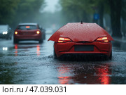 A red sports car driving on a rainy road. However, its roof unusually resembles an open umbrella, which gives the picture a surreal and fantastic character. The rain is pouring down the street, puddles have formed on the asphalt, in which the lights of the cars are reflected. The background is blurred, creating an atmosphere of movement and bad weather. The main mood of the scene is a combination of dynamics, wet asphalt and an unexpected artistic element in the form of an "umbrella". Стоковое AI-изображение, AI-художник Анна Кривицкая / Фотобанк Лори