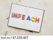 Книга и слово IMPEACH на светлом фоне. Стоковое фото, фотограф Pixel_shot / Фотобанк Лори