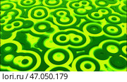 Glowing colorful green intersected circles creating a transforming a transforming and changing field. Стоковая иллюстрация, иллюстратор David Kashakhi / Фотобанк Лори