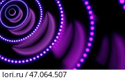 Abstract moving concentric rings of glowing spheres on a dark background. Стоковое фото, фотограф David Kashakhi / Фотобанк Лори