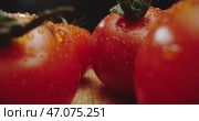 Fresh and Ripe Tomatoes Beautifully Arranged on a Rustic Wooden Surface for Display. Стоковое видео, видеограф Владимир Ковальчук / Фотобанк Лори