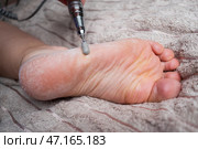 Hardware pedicure for yourself, chiropody and podology concept, foot care. Стоковое фото, фотограф Станислав Тарко / Фотобанк Лори