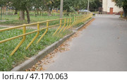City railings and handrails for pedestrians over green grass background. Стоковое видео, видеограф Дмитрий Нечаев / Фотобанк Лори