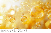 Suspended yellow soap bubbles create a mesmerizing atmosphere with golden luminescence. Желтые мыльные пузыри плавают и переливаются на ярком фоне, улавливая свет в игривом танце. Пузыри создают чарующую атмосферу, вызывая чувство радости и удивления. Стоковое AI-изображение, AI-художник Katsiaryna Repich / Фотобанк Лори