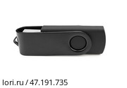 Черный USB-накопитель на белом фоне. Стоковое фото, фотограф Pixel_shot / Фотобанк Лори