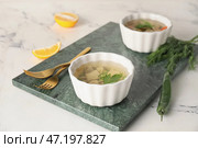 Чаша вкусного заливного на столе. Стоковое фото, фотограф Pixel_shot / Фотобанк Лори