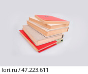 Stack of books isolated on a white background. Стоковое фото, фотограф Елена  Попкова / Фотобанк Лори
