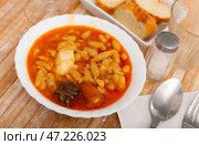 Tasty homemade stew of asturian beans with sausages. Spanish cuisine. Стоковое фото, фотограф Яков Филимонов / Фотобанк Лори