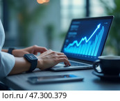 A Person Analyzing Financial Data on a Laptop While Sipping Coffee in a Modern Workspace During Daytime. Стоковое AI-изображение, AI-художник Sergey Grishin / Фотобанк Лори