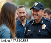 A Police Officer Engages With Community Members During a Neighborhood Event, Fostering Positive Relationships and Trust. Стоковое AI-изображение, AI-художник Sergey Grishin / Фотобанк Лори