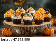 Delicious Halloween Cupcakes Decorated With Spiders and Webs on a Wooden Platter. Стоковое AI-изображение, AI-художник Юлия Гапеенко / Фотобанк Лори