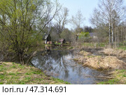 Landscape in early spring with melt water. Village in Russia. Стоковое фото, фотограф Володина Ольга / Фотобанк Лори